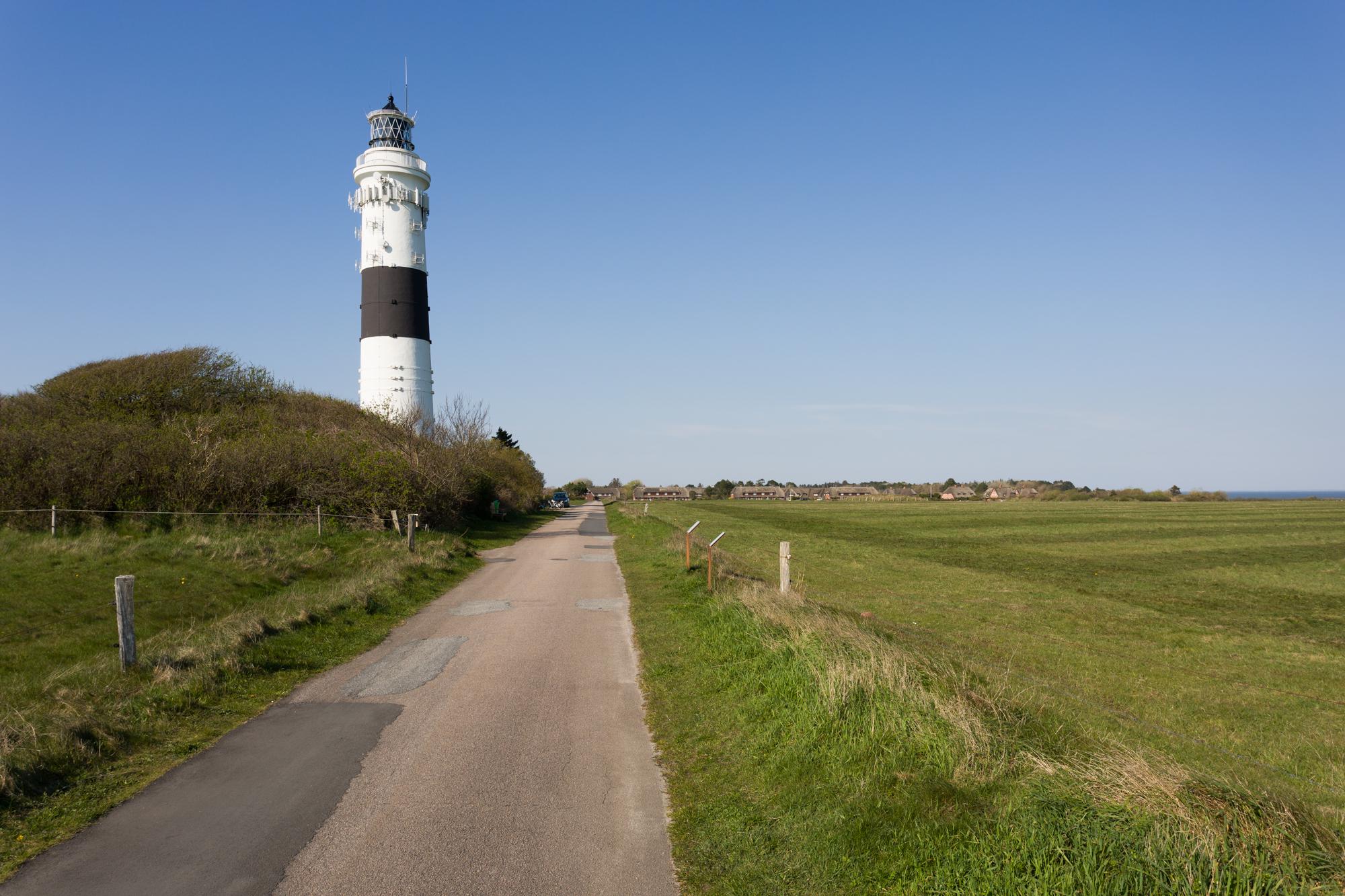 The lighthouse nicknamed "Langer Christian" is easily accessible via road and features a black and white colour.